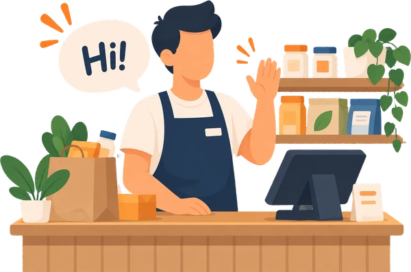 A shopkeeper waving hello from behind the counter
